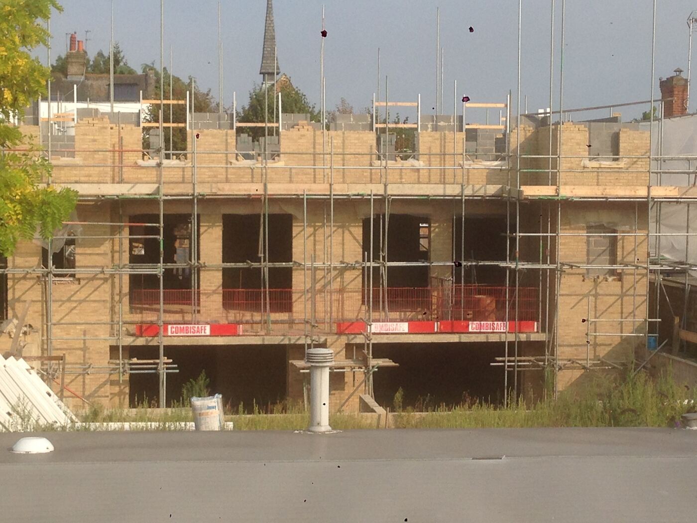 New Road, Ware during construction — brickwork rising above the basement level